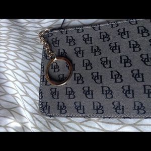 Dooney &Bourke wallet/WRISTLET. Brand new.
